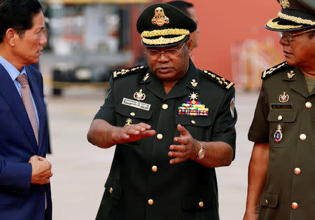 Hing Bun Hieng, the commander of Cambodian Prime Minister Hun Sen's bodyguard unit, speaks at the International Airport of Phnom Penh as he accompanies PM Hun Sen to Singapore for the 32nd ASEAN Summit, in Phnom Penh, Cambodia, April 27, 2018. REUTERS/Stringer/Files