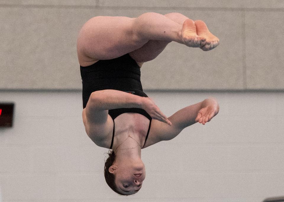 Dover’s Taylor Tuohy competes in the District 3 Class 3A diving competition at Dover High School on Saturday, Feb. 24, 2024.