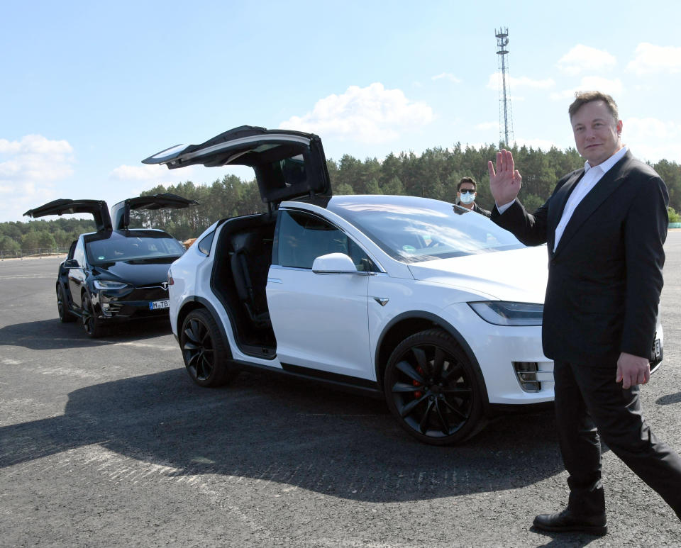 03 September 2020, Brandenburg, Grünheide: Elon Musk, Tesla boss, runs to a Tesla at the Tesla Gigafactory construction site. In Grünheide near Berlin, a maximum of 500,000 vehicles per year are to roll off the assembly line starting in July 2021. According to the car manufacturer's plans, the maximum should be reached as soon as possible. Photo: Julian Stähle/dpa-Zentralbild/dpa (Photo by Julian Stähle/picture alliance via Getty Images)