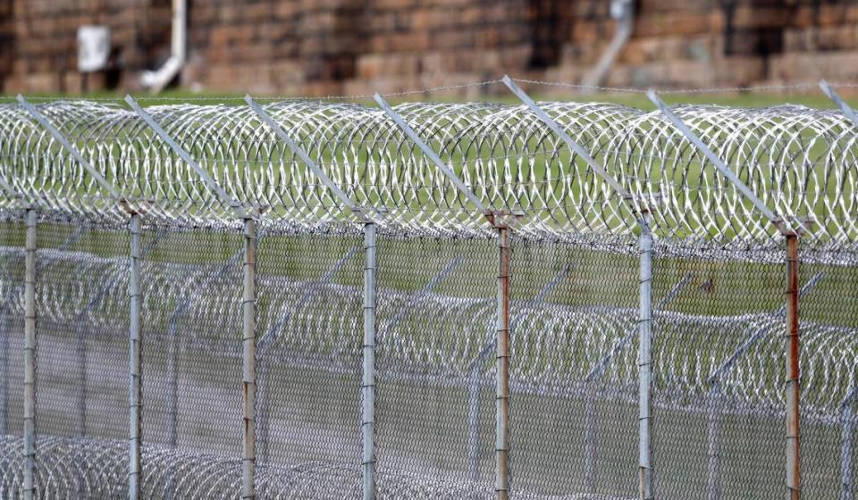 A detail of some of the fence around Central Prison in Raleigh, N.C., photographed on Monday, April 6, 2020.