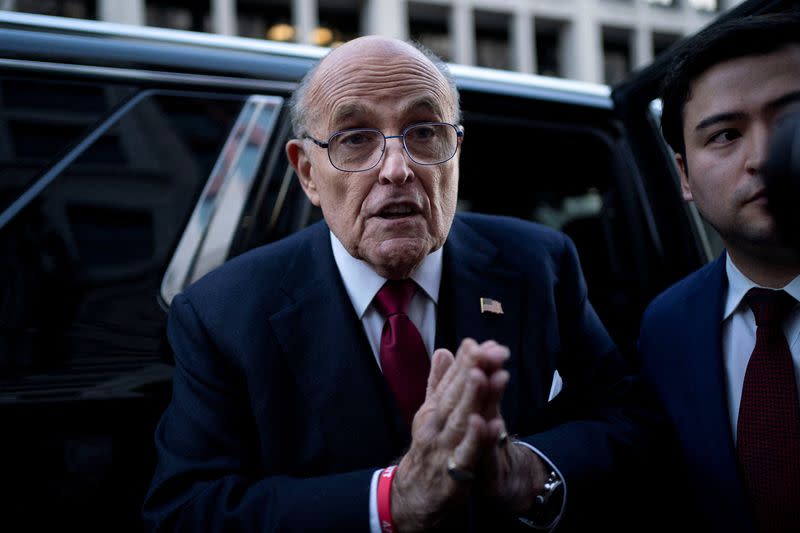 FILE PHOTO: Former New York Mayor Rudy Giuliani departs defamation lawsuit at the District Courthouse in Washington