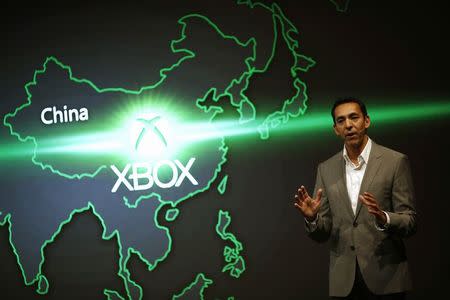 Yusuf Mehdi, head of marketing and strategy for Microsoft's Xbox group, speaks during the presentation of the Xbox One as part of ChinaJoy 2014 China Digital Entertainment Expo and Conference in Shanghai July 30, 2014. Microsoft Corp will launch its Xbox One gaming console in China on September 23, making it the first foreign company to start selling consoles in the world's third biggest gaming market after a ban on the devices was lifted this year. REUTERS/Carlos Barria