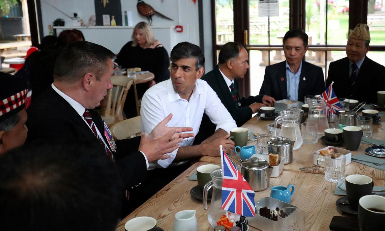 <span>Rishi Sunak chats to military veterans in his Richmond and Northallerton constituency on Saturday.</span><span>Photograph: Scott Heppell/AFP/Getty Images</span>