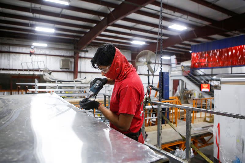 Matt Arnold, CEO of Look Trailers, tours the company's utility trailer manufacturing facility in Middlebury