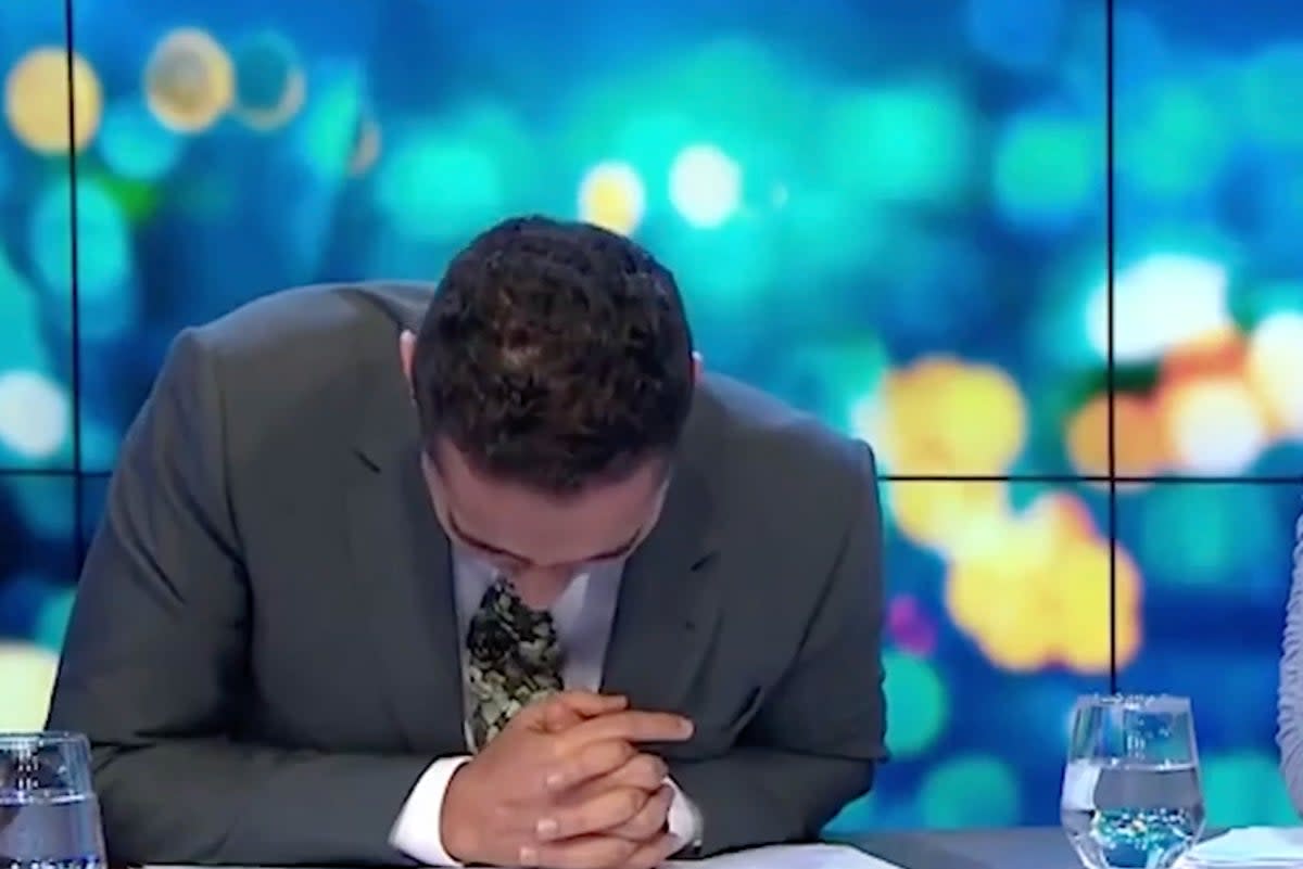 Waleed Aly then held his head down toward the desk after Margolyes asked him, ‘What are you? Sort of brown?’ (Channel 10)