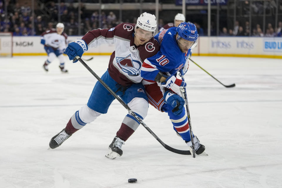 Colorado Avalanche defenseman Bowen Byram (4) skates against New York Rangers left wing Artemi Panarin (10) during the second period of an NHL hockey game, Monday, Feb. 5, 2024, at Madison Square Garden in New York. (AP Photo/Mary Altaffer)