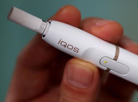 Philip Morris' iQOS Tobacco Device Gets Qualified Support For 'Safer'  Claims : Shots - Health News : NPR