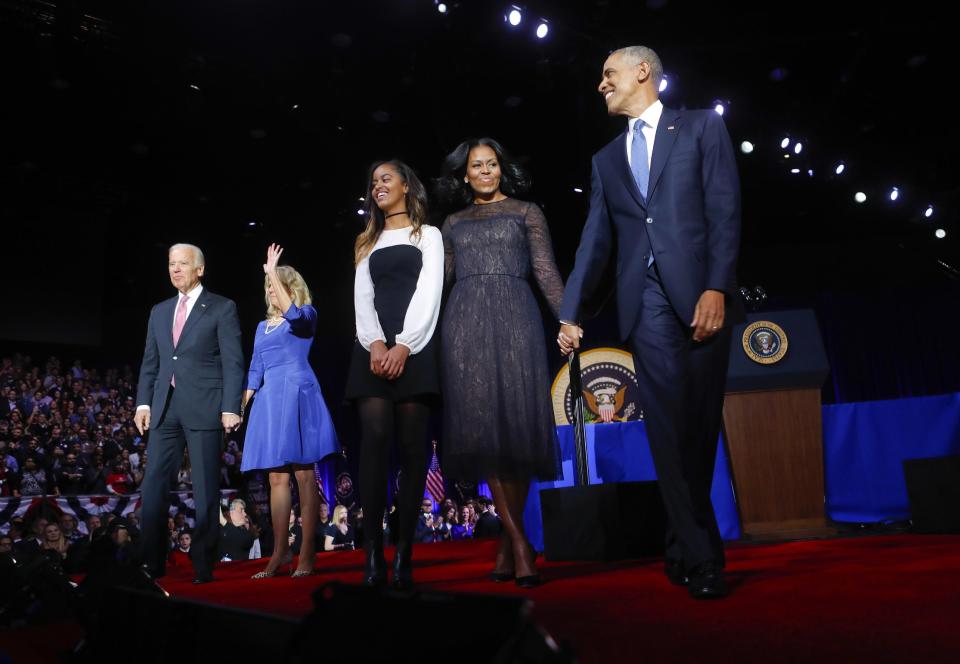 President Barack Obama walks on stage with first lady Michelle Obama, daughter Malia, Vice President Joe Biden and his wife Jill Biden after his farewell address at McCormick Place in Chicago, Tuesday, Jan. 10, 2017. (AP Photo/Pablo Martinez Monsivais)