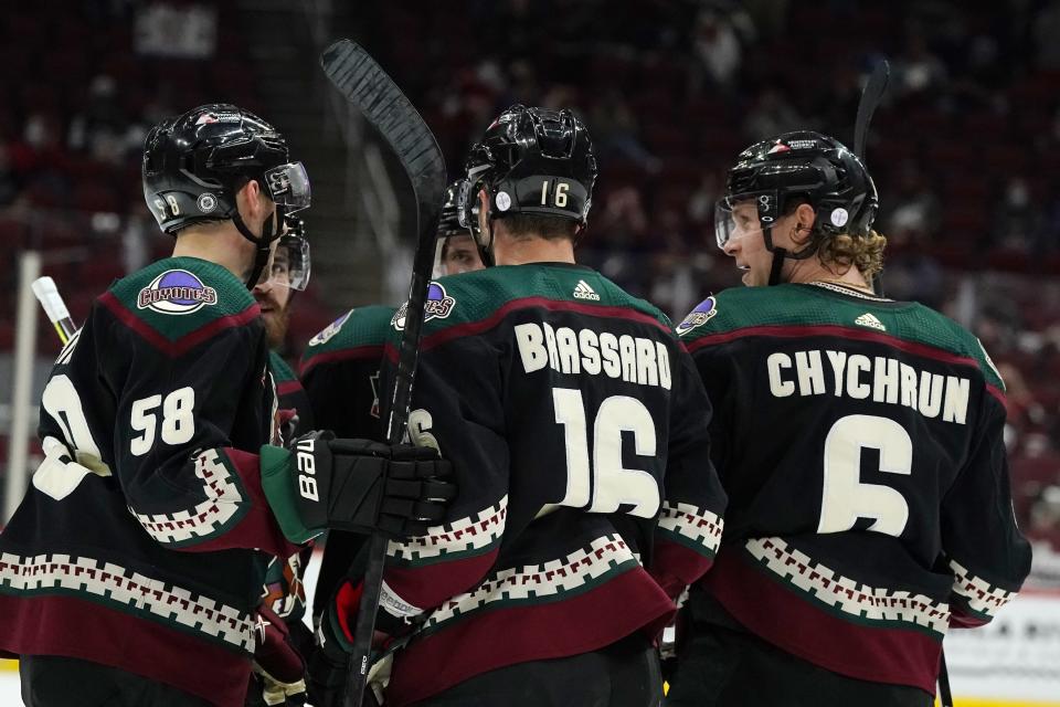 Arizona Coyotes defenseman Jakob Chychrun (6) celebrates his goal against the Los Angeles Kings with teammates, including left wing Michael Bunting (58) and center Derick Brassard (16), during the first period of an NHL hockey game Wednesday, May 5, 2021, in Glendale, Ariz. (AP Photo/Ross D. Franklin)