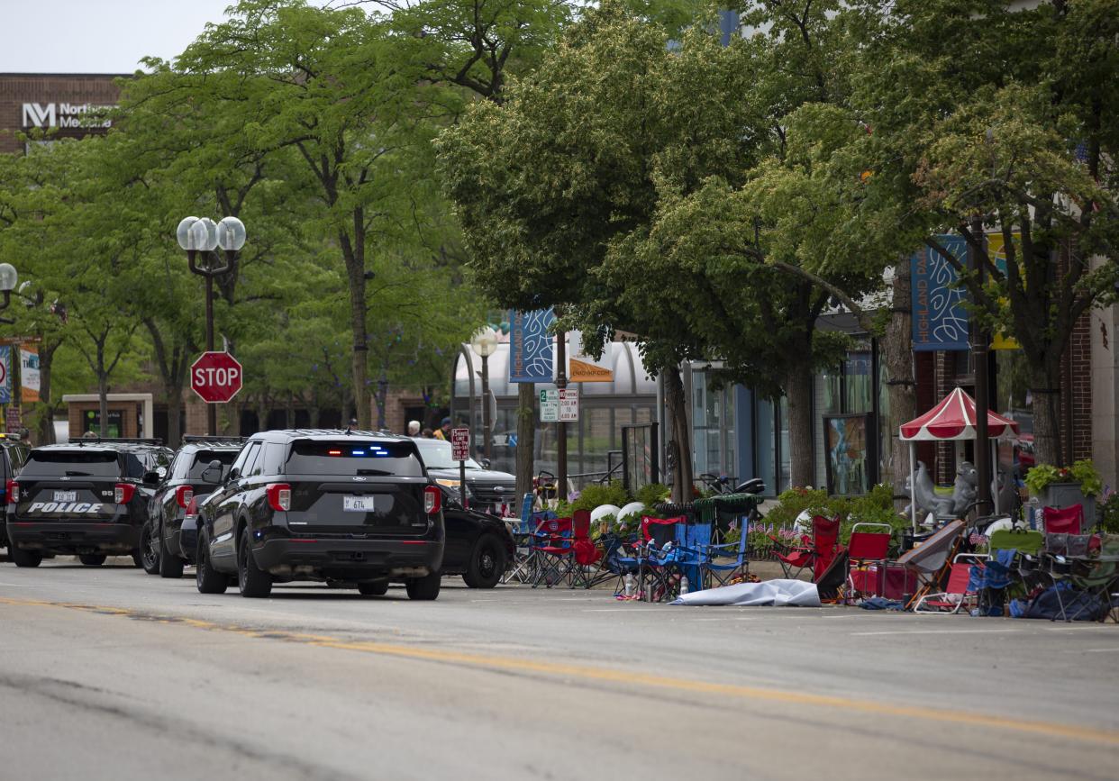 First responders work the scene of a shooting at a Fourth of July parade on July 4, 2022 in Highland Park, Illinois. 