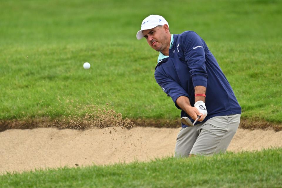 Sep 22, 2023; Sugar Grove, Illinois, USA; Chase Koepka hits out of a bunker on the second green during the first round of the LIV Golf Chicago golf tournament at Rich Harvest Farms. Mandatory Credit: Jamie Sabau-USA TODAY Sports