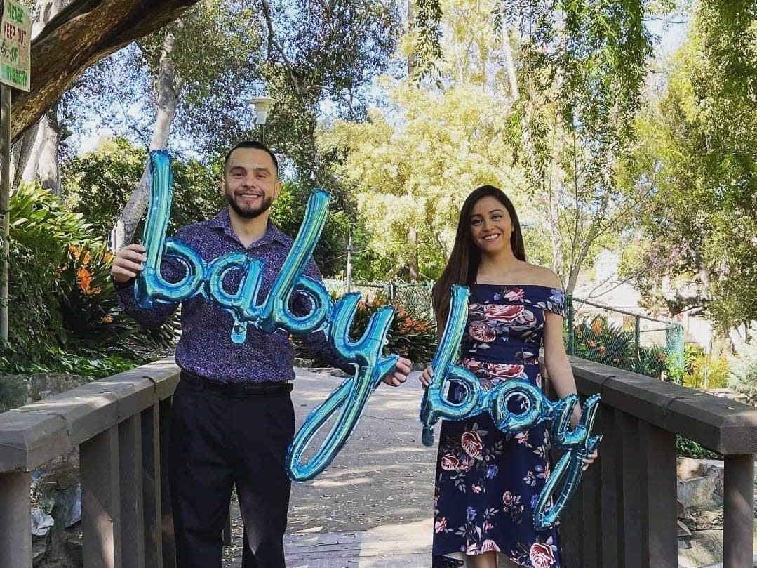 A couple, who later found out their IVF had a mutant cancer gene, are shown at his gender reveal