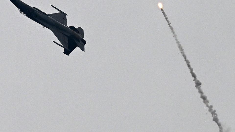 A Pakistan Air Force F-16 fighter jet performs aerobatic maneuvers during Pakistan's national day parade in Islamabad on March 23, 2024. (Aamir Qureshi/AFP via Getty Images)