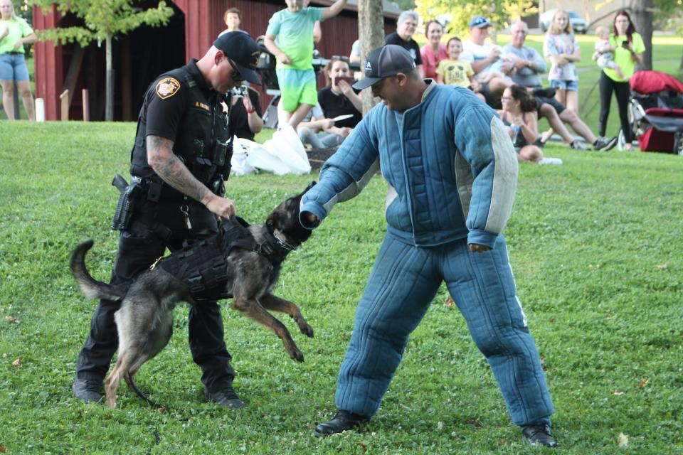 Police K9 demonstrations draw a crowd during National Night Out.