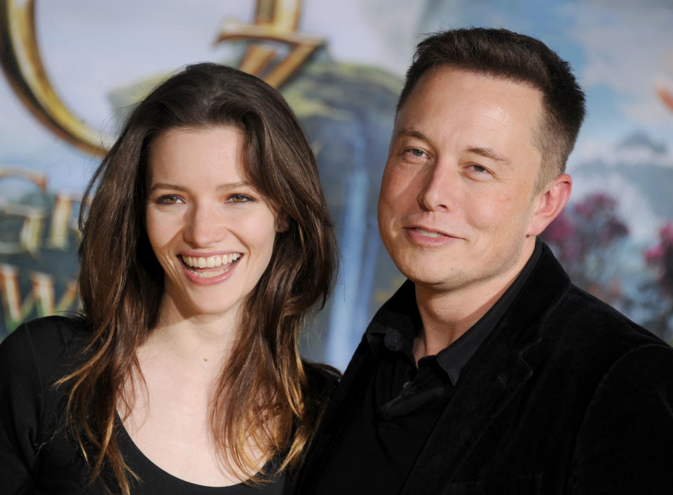 HOLLYWOOD, CA - FEBRUARY 13:  Actress Talulah Riley and Elon Musk, co-founder of Paypal and Tesla Motors, arrive at the Los Angeles premiere of 