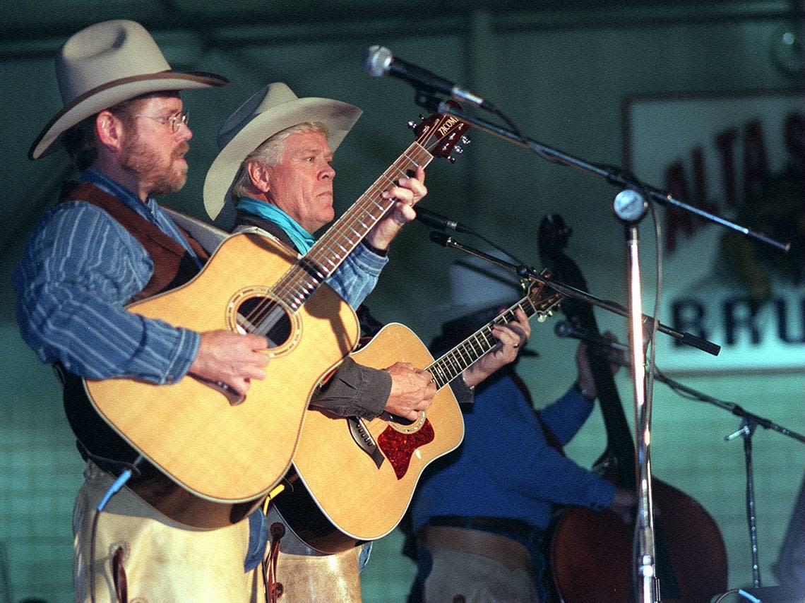 Lon Hannah, Jack Hannah and Joe Hannah, left to right, of the Sons of the San Joaquin perform in May 1998 at the Alta Sierra school gymnasium.