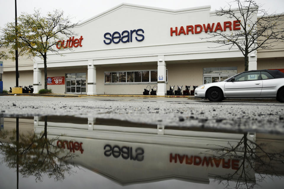 FILE- This Oct. 15, 2018, file photo shows a sign for a Sears Outlet department store is displayed in Norristown, Pa., Monday, Oct. 15, 2018. Sears Hometown and Outlet Stores, Inc. is not part of the Sears Holdings Corp.’s Chapter 11 bankruptcy filing on Oct. 15. Sears Hometown and Outlet Stores separated from Sears Holdings in 2012. (AP Photo/Matt Rourke, File)