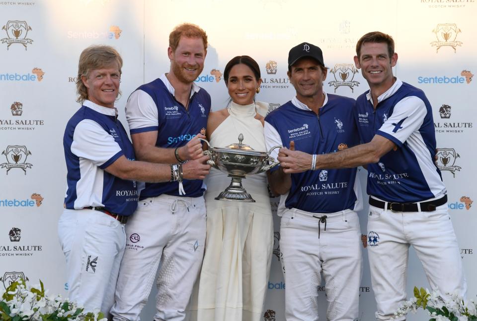 Dana Barnes, Prince Harry, Duke of Sussex, Meghan, Duchess of Sussex, Adolfo Cambiaso and Malcolm Borwick during the Royal Salute Polo Challenge benefitting Sentebale at Grand Champions Polo Club on April 12, 2024 in Wellington, Florida. The annual Polo Cup has been running since 2010, and to date has raised over £11.4 million to support Sentebale's work with children and young people affected by poverty, inequality and HIV/AIDS in southern Africa.