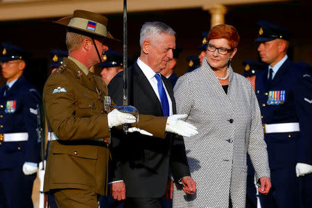 U.S. Secretary of Defence Jim Mattis walks with Australia's Minister for Defence Marise Payne during an inspection of an honour guard as part of the 2017 Australia-United States Ministerial Consultations (AUSMIN) meetings at the Australian Army's Victoria Barracks in Sydney, Australia, June 5, 2017. REUTERS/David Gray