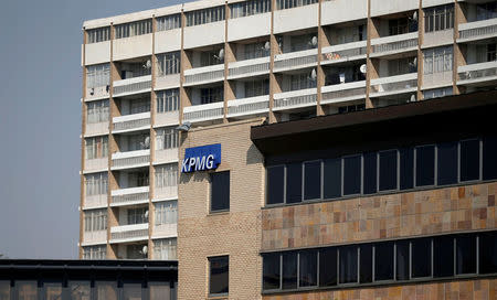 The KPMG logo is seen at the company's head offices in Parktown, Johannesburg, South Africa, September 15, 2017. REUTERS/Siphiwe Sibeko