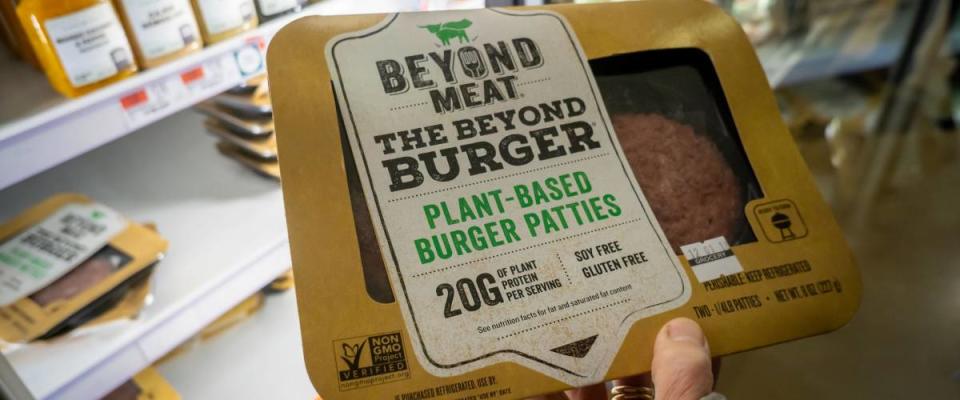 New York NY/USA-November 19, 2018 A shopper chooses a package of Beyond Meat from a freezer in a supermarket in New York on Monday, November 19, 2018.