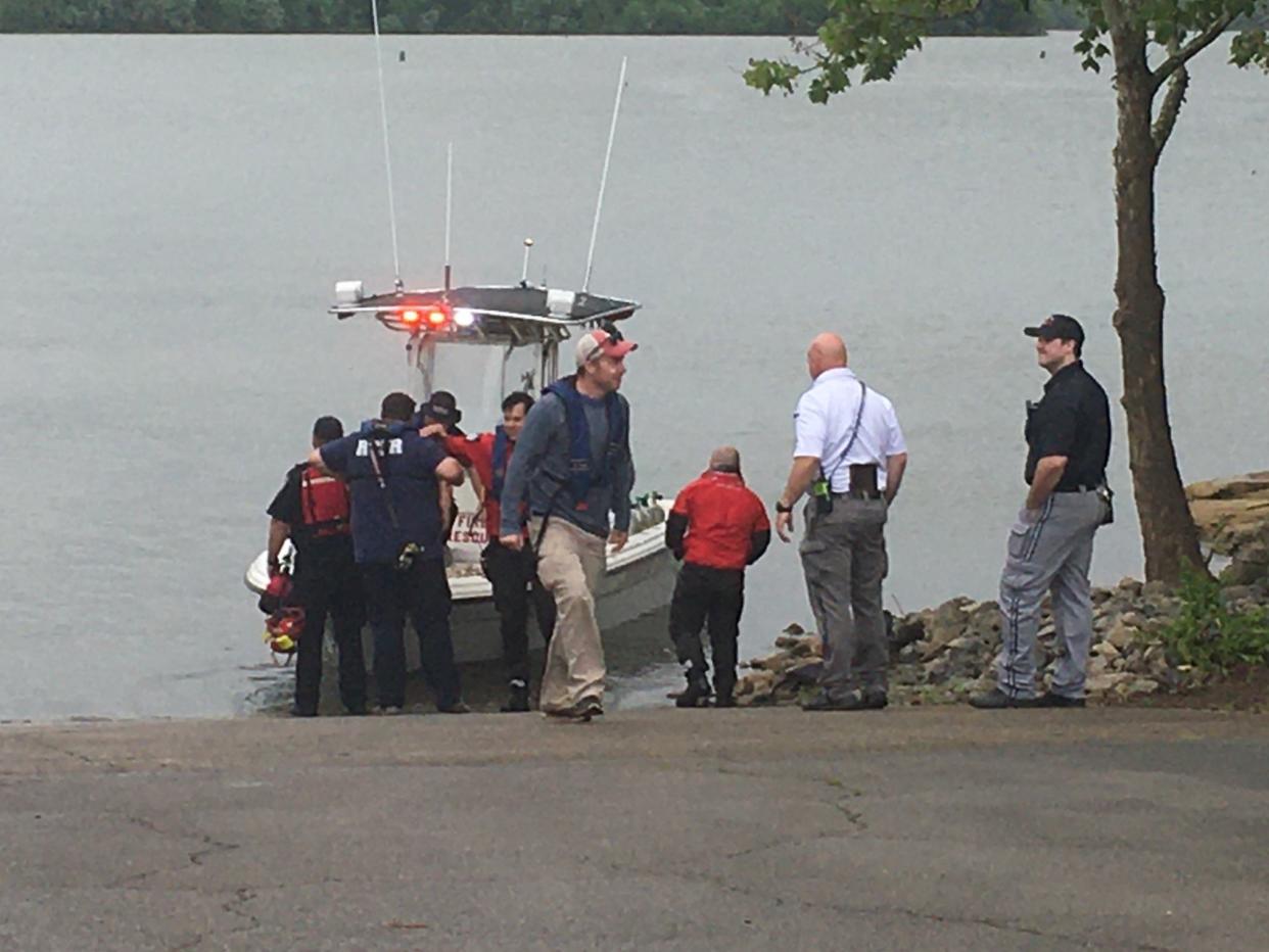 <p>Rescue operators with a boat searching for a private plane that crashed into Percy Priest Lake in Tennessee.</p> (Rutherford County Fire Rescue)
