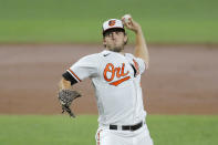 Baltimore Orioles starting pitcher John Means throws a pitch to the Miami Marlins during the third inning of a baseball game, Tuesday, Aug. 4, 2020, in Baltimore. (AP Photo/Julio Cortez)