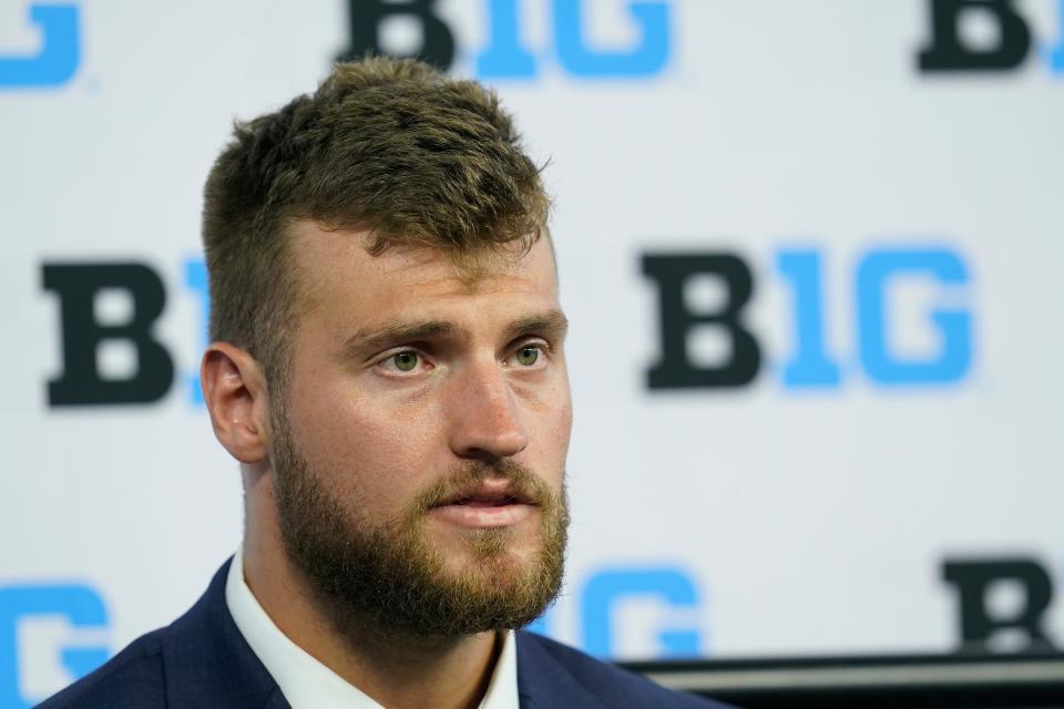 Purdue tight end Payne Durham talks to reporters during an NCAA college football news conference at the Big Ten Conference media days, at Lucas Oil Stadium, Wednesday, July 27, 2022, in Indianapolis. (AP Photo/Darron Cummings)