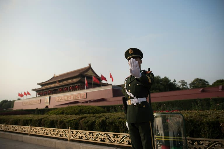 A Chinese paramilitary member stands near Tiananmen square in Beijing, China, on October 22, 2017. The US government has been increasingly worried about Beijing's spying