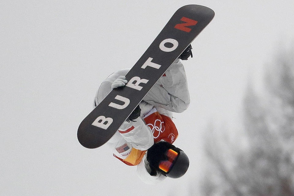 FILE - In this Feb. 14, 2018, file photo, Shaun White, of the United States, jumps during the men's halfpipe finals at Phoenix Snow Park at the 2018 Winter Olympics in Pyeongchang, South Korea. Jake Burton Carpenter, the man who changed the game on the mountain by fulfilling a grand vision of what a snowboard could be, died Wednesday night, Nov. 21, 2019, of complications stemming from a relapse of testicular cancer. He was 65. (AP Photo/Lee Jin-man, File)