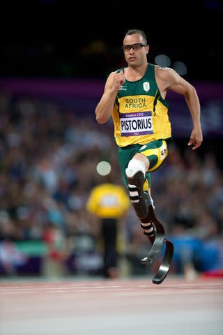 <p>Simon Bruty /Sports Illustrated via Getty</p> Oscar Pistorius competing during the London 2012 Olympics