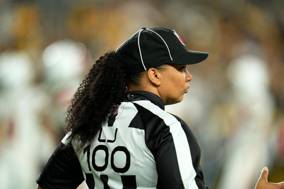 Line judge Maia Chaka (100) works an NFL football game between the Pittsburgh Steelers and the Cleveland Browns in Pittsburgh, Monday, Sept. 18, 2023.