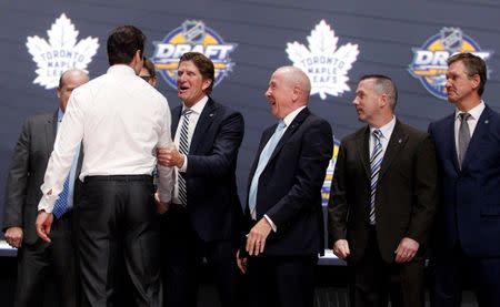 Jun 24, 2016; Buffalo, NY, USA; Auston Matthews is congratulated by Toronto Maple Leafs head coach Mike Babcock after being selected as the number one overall draft pick by the Toronto Maple Leafs in the first round of the 2016 NHL Draft at the First Niagra Center. Mandatory Credit: Timothy T. Ludwig-USA TODAY Sports