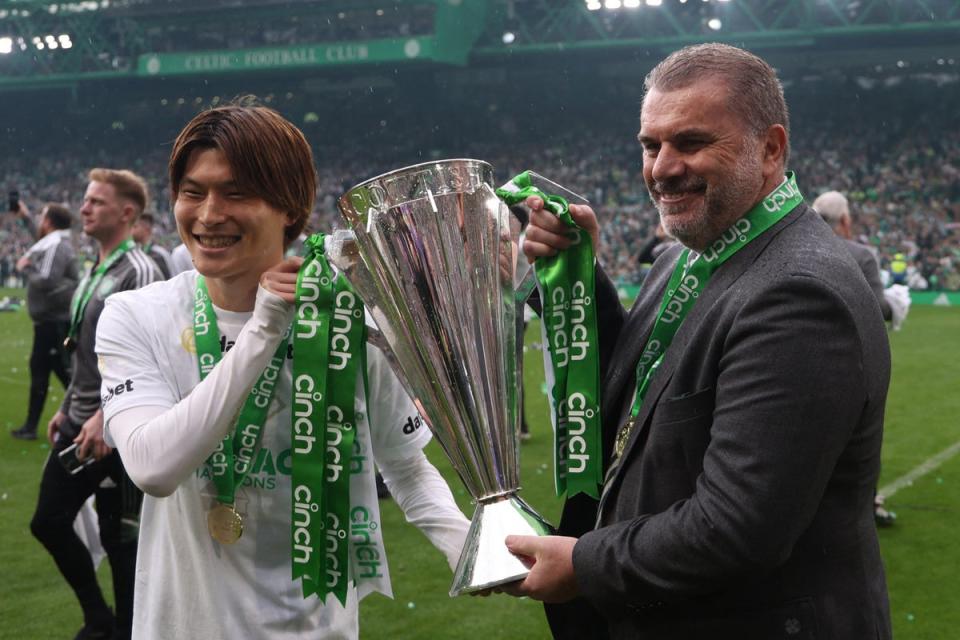 Treble winner: Ange Postecoglou won five of six available domestic trophies during his two years at Celtic (REUTERS)