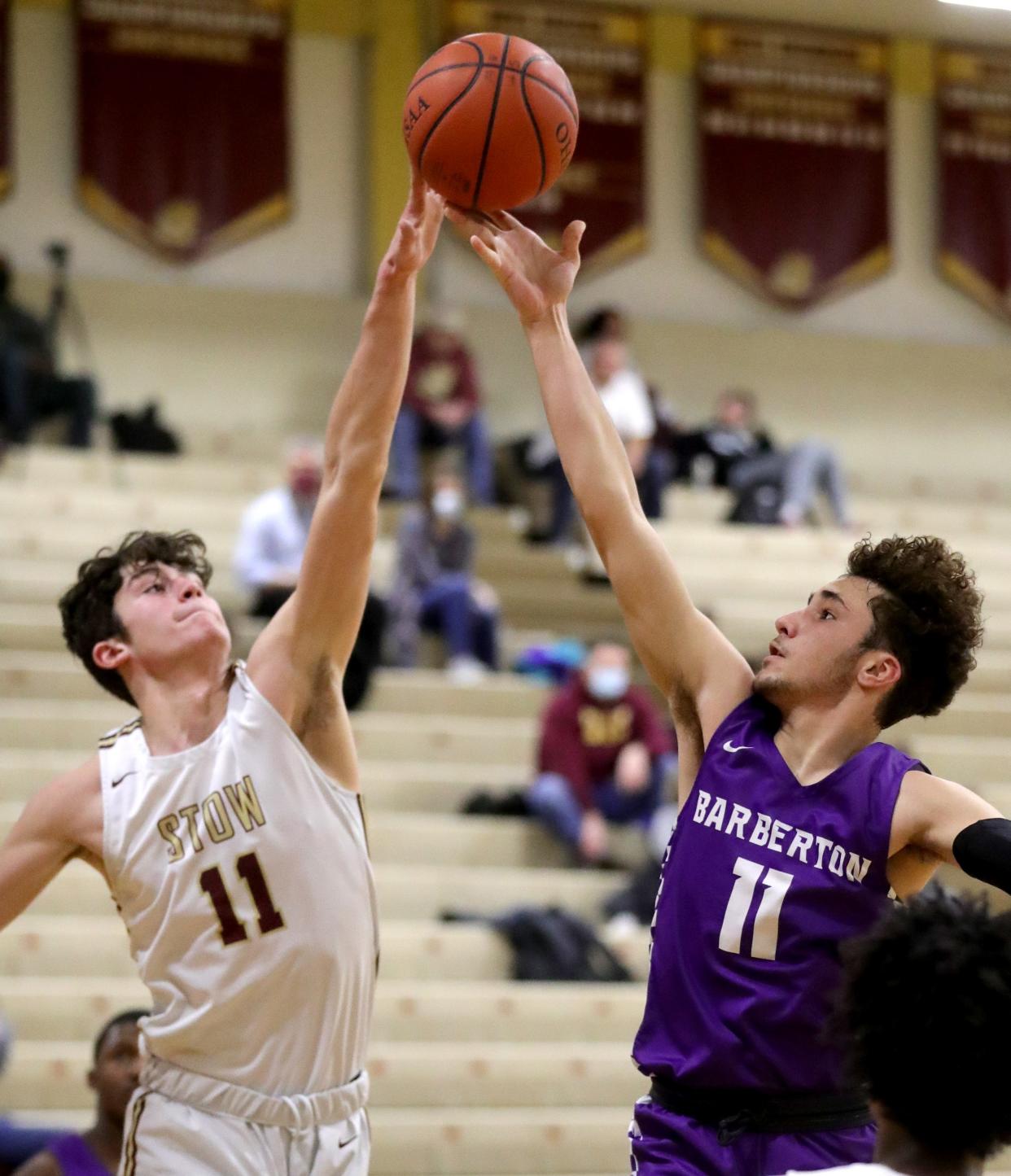 Stow's AJ Pestello, Jr. blocks the shot of Barberton's Tony Fox on Tuesday, Jan. 18, 2022 in Stow.