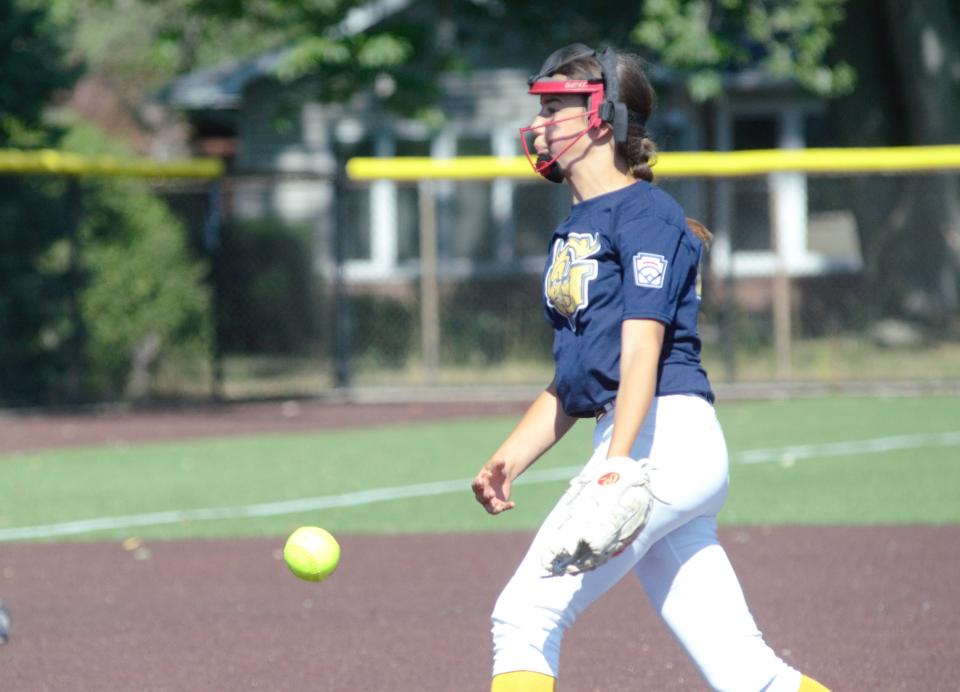 Piper Wangler pitches during the quarterfinals of the Little League Softball Majors state tournament on Tuesday, July 12 in Grosse Pointe Woods, Mich.