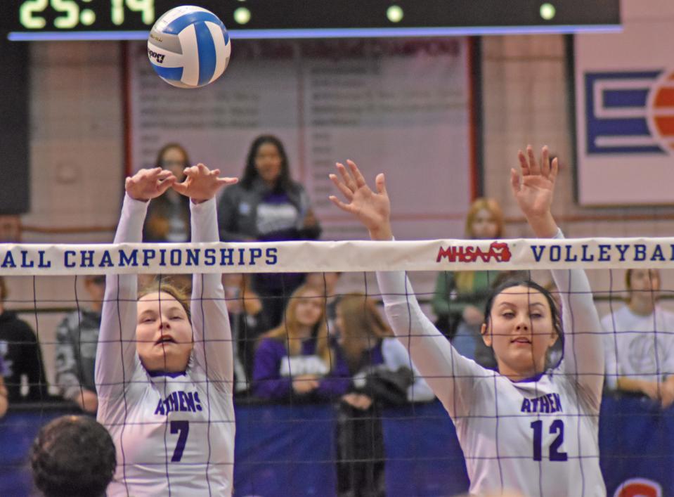 The Athens duo of Sarah Roe (7) and Piper Porter (12) look for a block versus Sacred Heart on Saturday in the D4 State Finals.