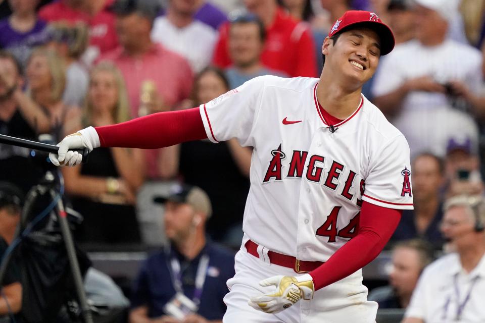Shohei Ohtani expresses his disappointment after one of his swings in the Home Run Derby failed to clear the fence.