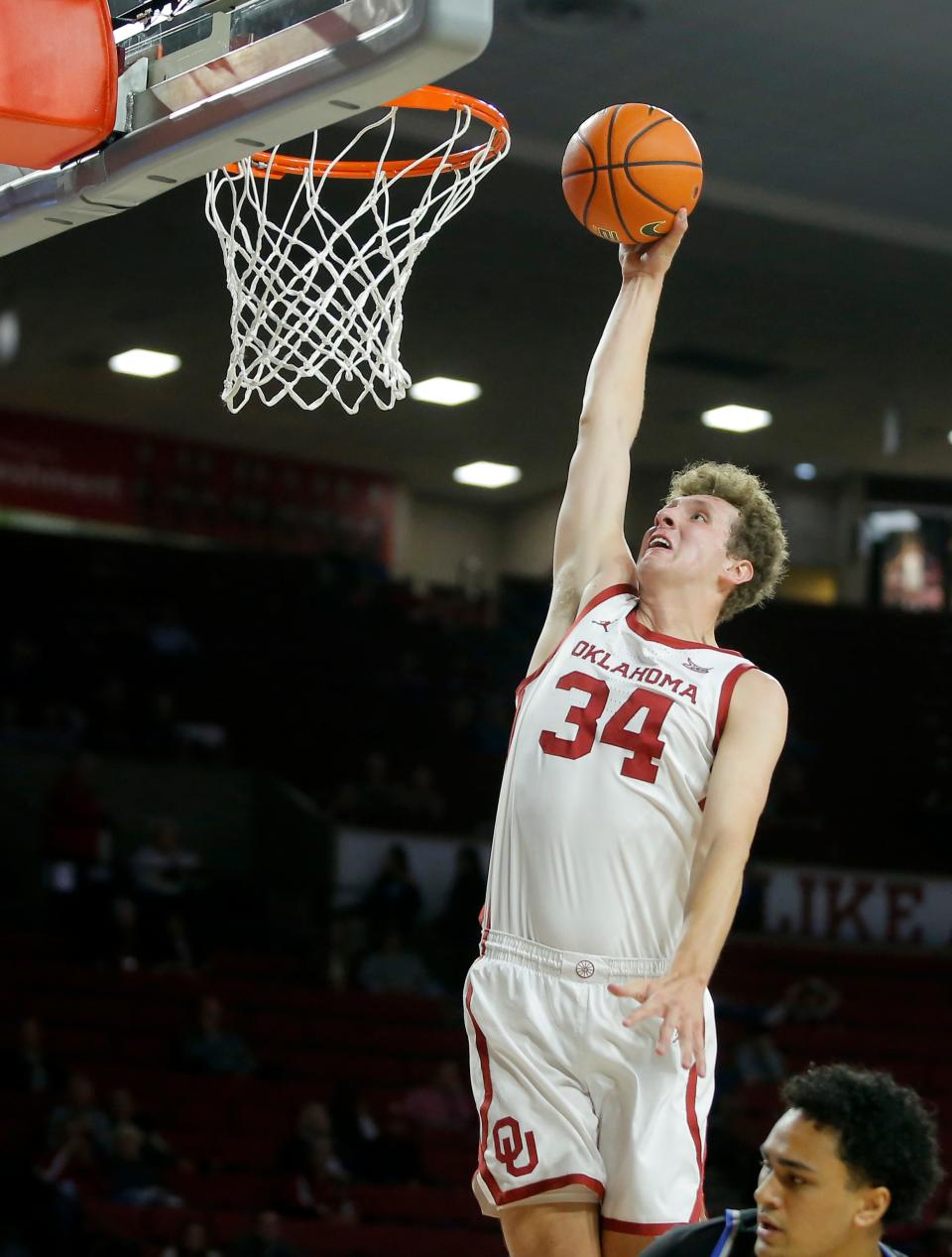 Oklahoma's Jacob Groves (34) dunks the ball during a college basketball exhibition game between the University of Oklahoma Sooners (OU) and the Oklahoma City University Starts (OCU) at Loyd Noble Center in Norman, Okla., Tuesday, Oct. 25, 2022. 