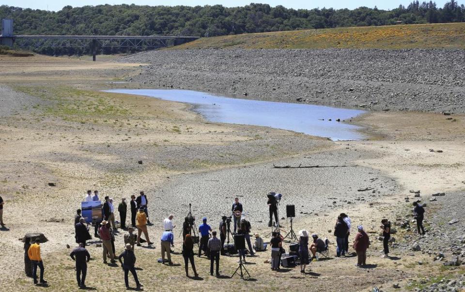 Governor Gavin Newsom holds a news conference in the parched basin of Lake Mendocino in Ukiah.