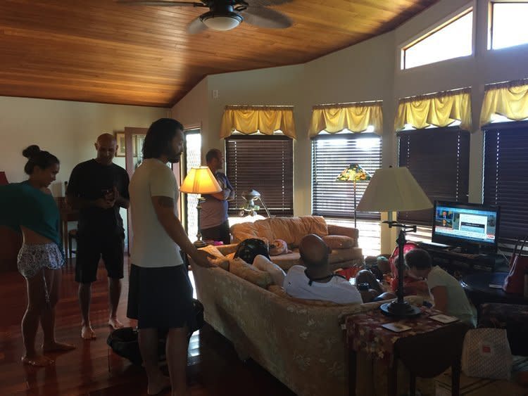 Carla Herreria's family gathered around to watch the news after learning the missile alert was sent by mistake. (Photo: Carla Herreria)
