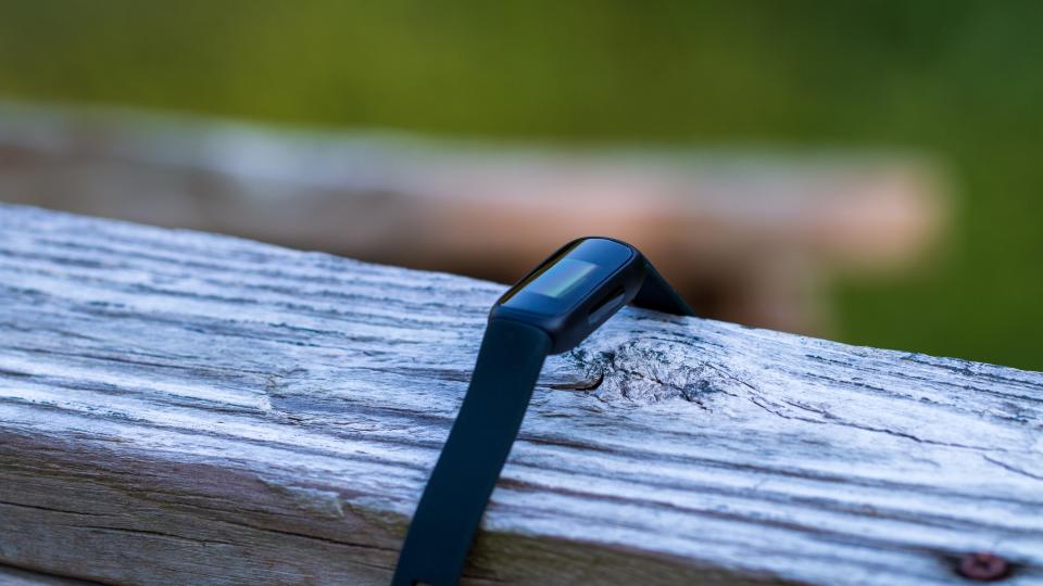 Fitbit Inspire 3 on porch railing