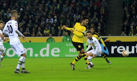 Football Soccer - Borussia Moenchengladbach v Borussia Dortmund - German Bundesliga - Borussia Park, Moenchengladbach, 23/01/16 Borussia Dortmund's Ilkay Guendogan scores a goalREUTERS/Ina Fassbender