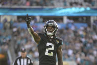 Jacksonville Jaguars' Rayshawn Jenkins (2) celebrates after the Jaguars recovers a fumble during the second half of an NFL football game against the Baltimore Ravens, Sunday, Nov. 27, 2022, in Jacksonville, Fla. (AP Photo/Phelan M. Ebenhack)
