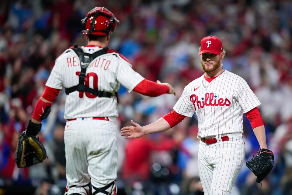 Philadelphia Phillies relief pitcher Craig Kimbrel celebrates their win with catcher J.T. Realmuto against the Arizona Diamondbacks in Game 1 of the baseball NL Championship Series in Philadelphia on Oct. 16, 2023. The Phillies won 5-3.