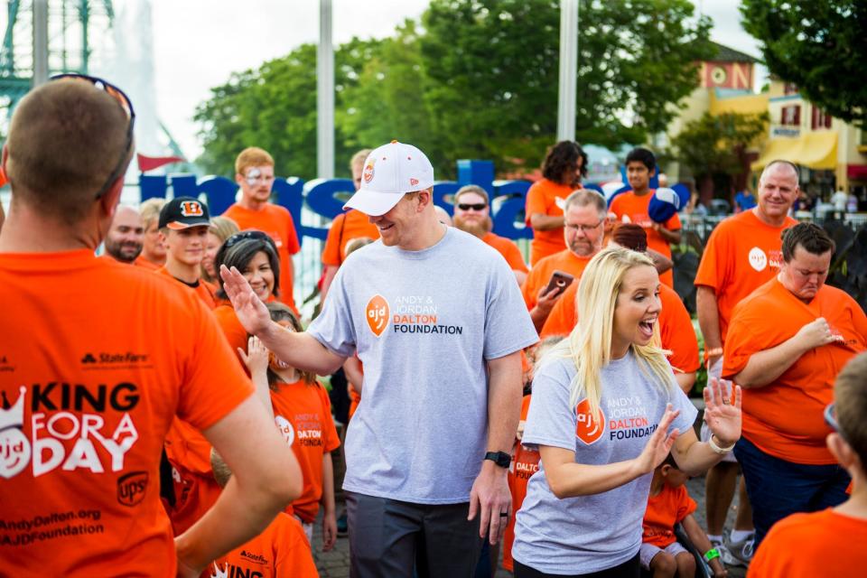 Andy (left) and Jordan Dalton (right) meet the 50 families at the "King for a Day" community outreach program hosted by The Andy & Jordan Dalton Foundation at Kings Island on Aug. 20, 2016, at Kings Island in Mason, Ohio. The families got to enjoy an all-expense-paid dream day with the Daltons.