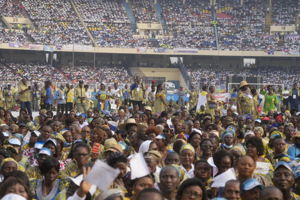Faithful crowd the Martyrs' Stadium in Kinshasa, Democratic Republic of Congo for a meeting between Francis and young people, Thursday, Feb. 2, 2023. Francis is in Congo and South Sudan for a six-day trip, hoping to bring comfort and encouragement to two countries that have been riven by poverty, conflicts and what he calls a "colonialist mentality" that has exploited Africa for centuries. (AP Photo/Gregorio Borgia)
