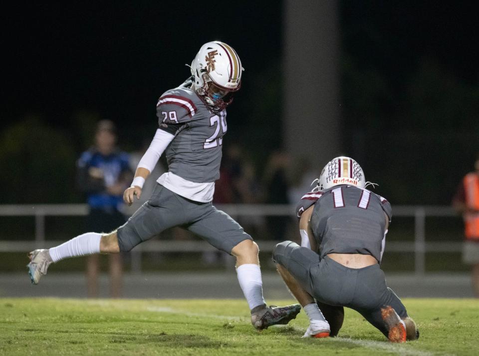 Brandon Ferguson (29) adds the extra point to take a 21-7 Chiefs lead during the Jay vs Northview football game at Northview High School in Century on Friday, Oct. 13, 2023.