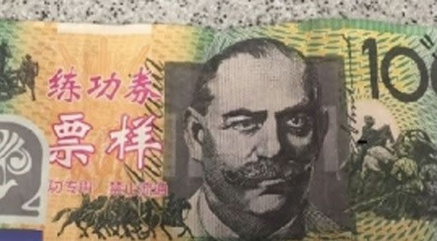 The fake note was emblazoned with bright red and white Chinese symbols. Photo: Victoria Police