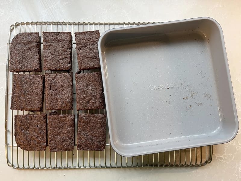 Brownies on cooling rack. they were made in a Caraway baking pan, which is also visible